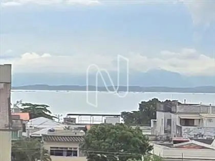 Vista mar da janela da sala