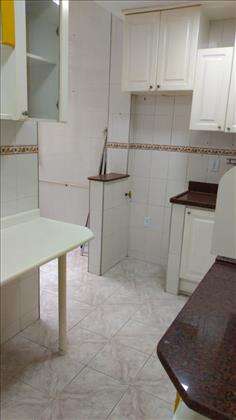 Cozinha com Armários Planejados com Mesa Embu