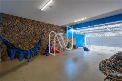 Área  