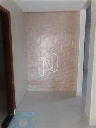 Hall de entrada com parede em 3 D.