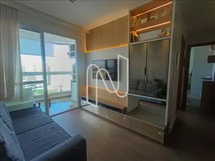 Sala de estar e jantar com decoração moderna